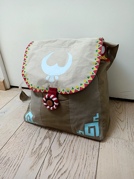 Photo d'un sac aux motifs inspirés du peuple Piaf dans The Legend of Zelda : Breath of the Wild